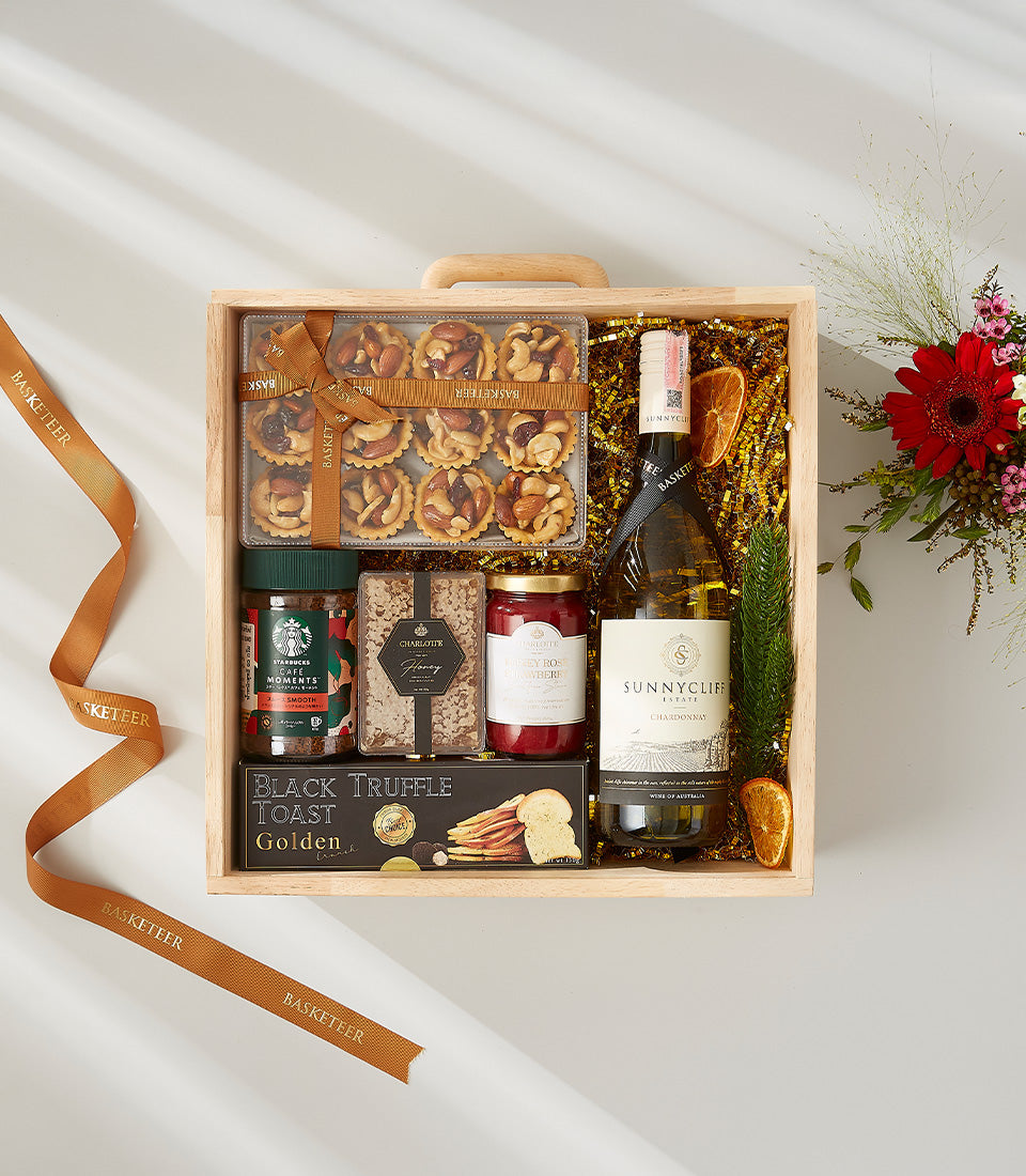 Chardonnay gourmet gift hamper with artisan tarts, jam, coffee and truffle toast in wooden tray