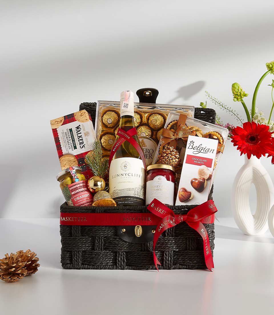 Sunnycliff Estate Chardonnay wine gift basket with gourmet chocolates, shortbread, and festive holiday décor