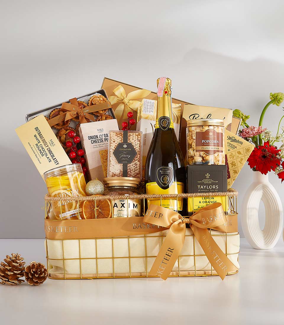 Luxury gift basket with Breganze Prosecco sparkling wine, gourmet treats, and fresh flowers in gold wire design