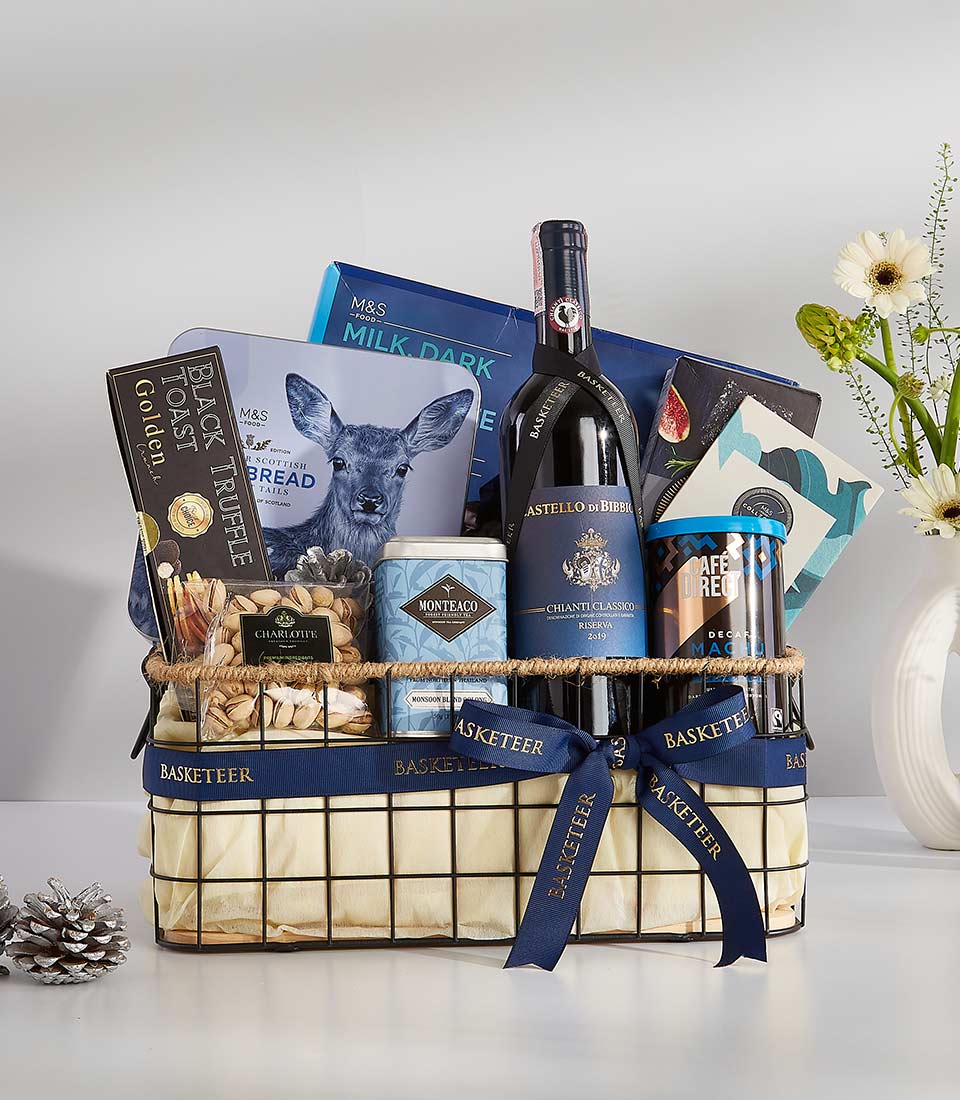 Castello Midnight Indulgence red wine gift basket with dark chocolate, gourmet coffee, tea, and pistachios in black wire