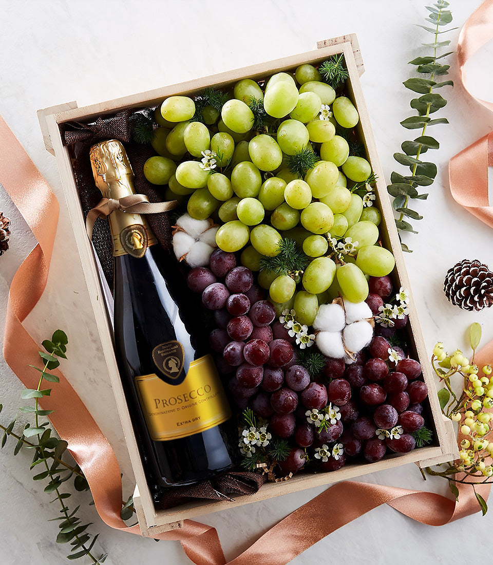 Prosecco Extra Dry with fresh grapes and baby's breath in wooden gift box