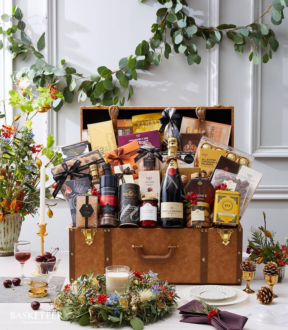 Luxury leather trunk hamper with Moët champagne, red wine, gourmet chocolates, and artisan treats
