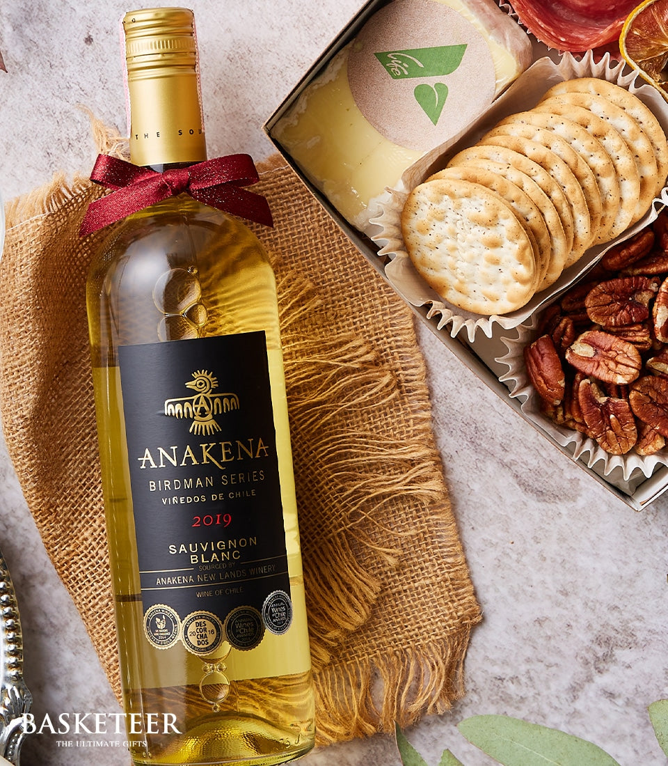 Premium white wine and gourmet cheese gift box with crackers and pecans, artisan wine pairing hamper
