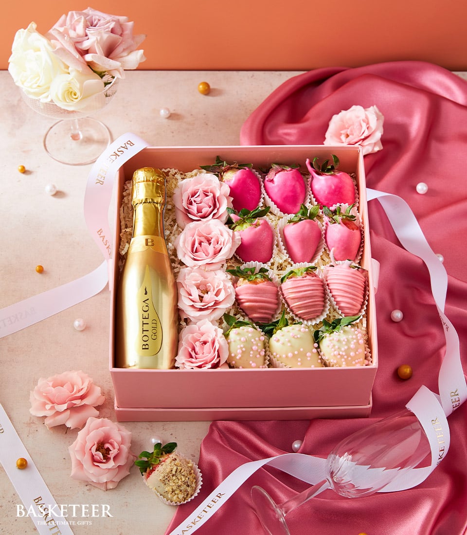 Luxury Valentine's gift box with Bottega Gold prosecco, chocolate-covered strawberries, and pink roses