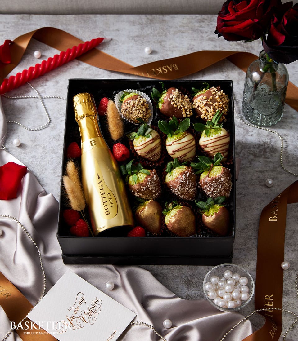 Luxury sparkling wine and chocolate-covered strawberry gift set with gold Bottega bottle for Valentine's Day