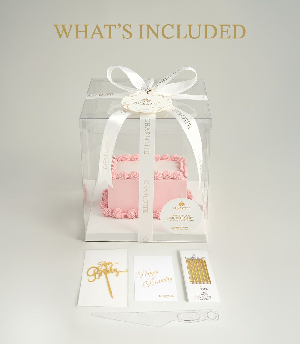 Personalised pink vanilla layer cake with edible photo, gold Happy Birthday topper, candles and server set