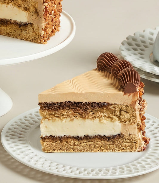 Charlotte Bakery's artisan mocha almond cake slice with swirled buttercream, rich chocolate