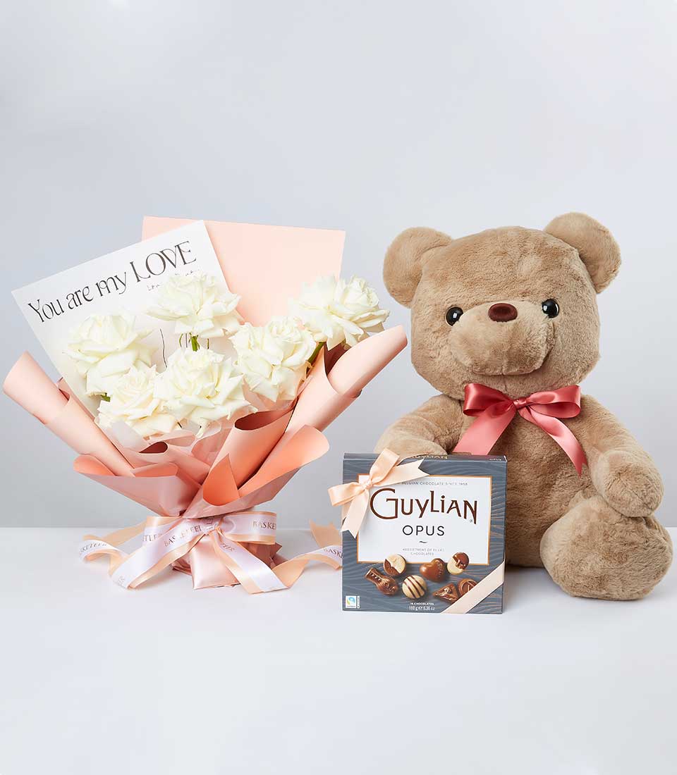 White roses with plush teddy bear and Guylian chocolates gift set