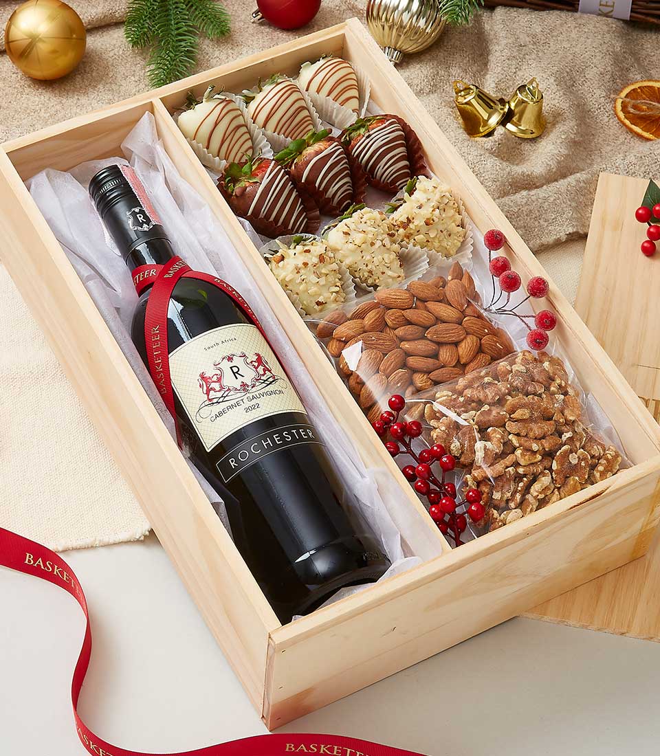 Luxury wooden wine gift box with Cabernet Sauvignon, chocolate-dipped strawberries, and gourmet nuts