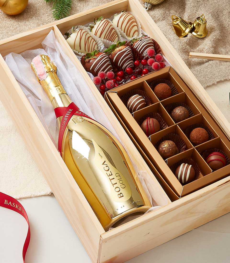 Luxury wooden gift box with Bottega Gold sparkling wine, chocolate-covered strawberries, and assorted truffles