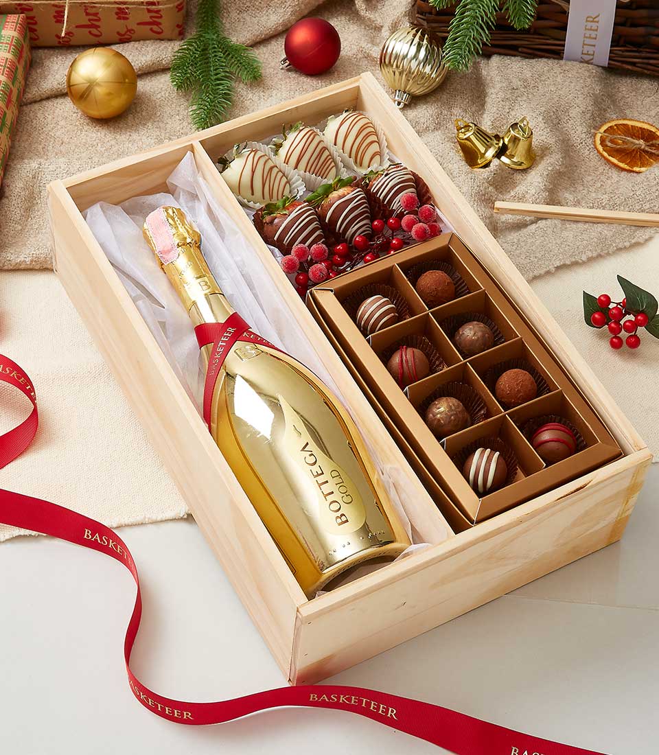Bottega Gold sparkling wine with chocolate-covered strawberries and assorted truffles in luxury wooden gift box
