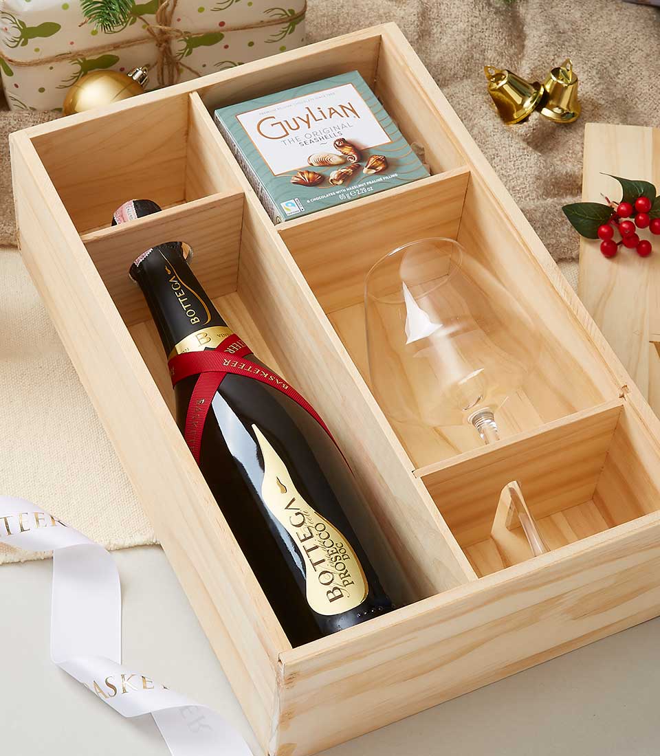 Premium Prosecco and Guylian chocolate gift set in wooden box with wine glass, festive presentation