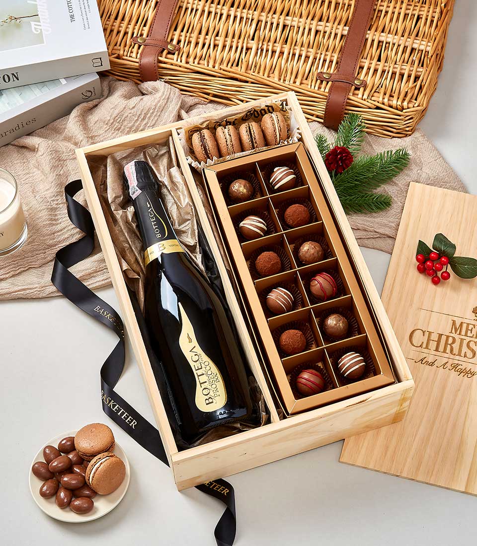 Premium wine and chocolate gift set in wooden box with Prosecco, artisan truffles, and macarons