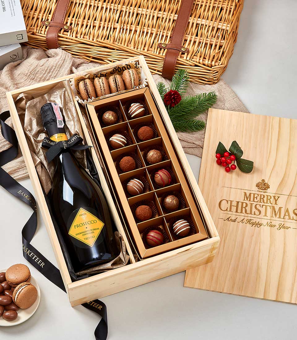 Premium wine and chocolate gift set with Prosecco, artisan truffles, and macarons in wooden box