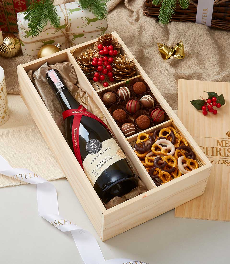 Premium wine and chocolate gift set in wooden box with Pepperjack Chardonnay, artisan chocolates, and festive trimmings