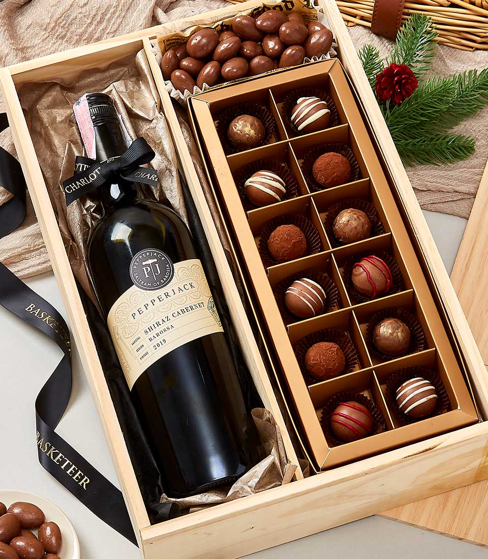 Luxury wooden wine and chocolate gift box with Shiraz Cabernet and artisan truffles