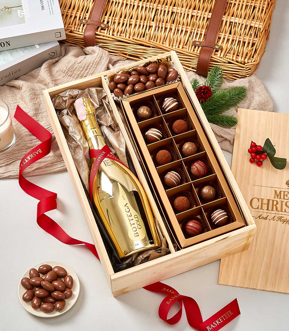 Luxury wine and chocolate Christmas gift box with Bottega Gold sparkling wine, chocolate-covered almonds, and assorted