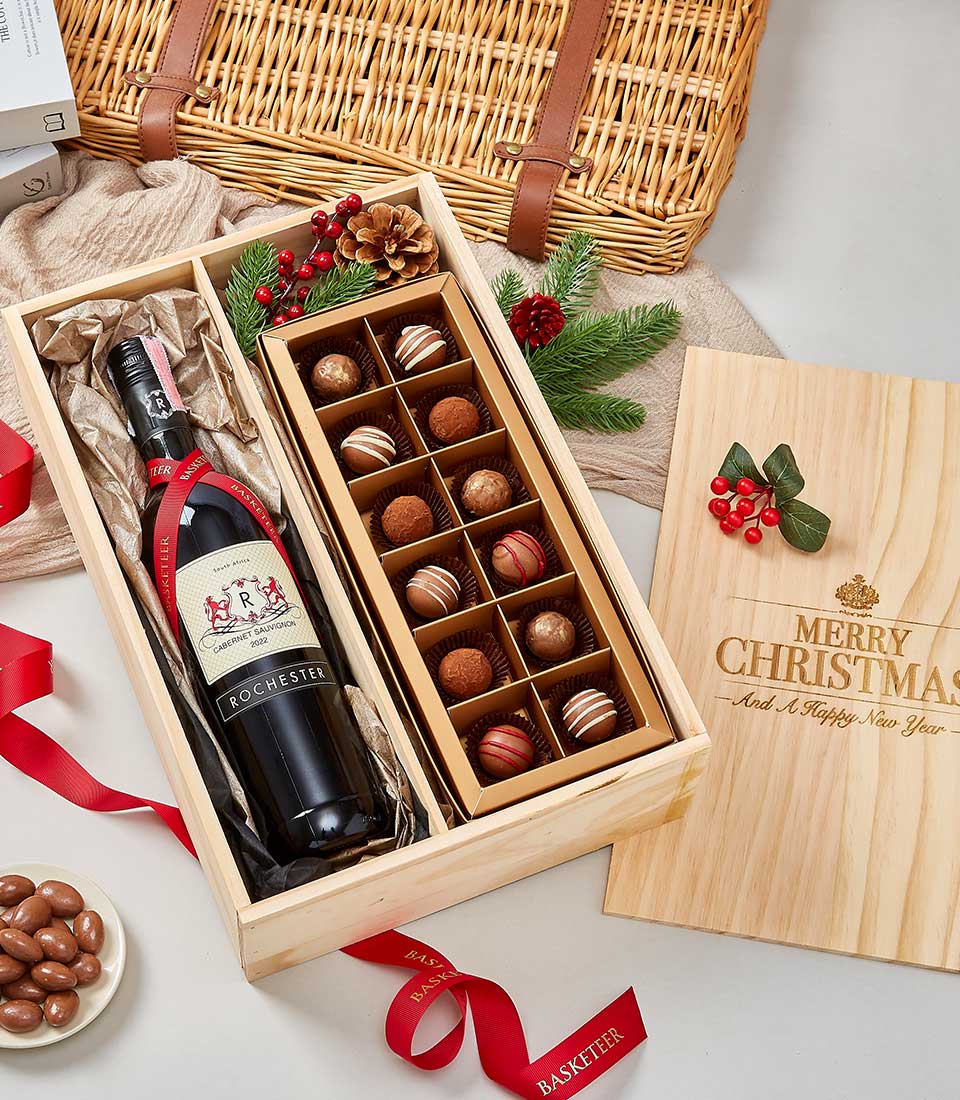 Premium red wine and chocolate gift set in wooden box with festive holiday engraving
