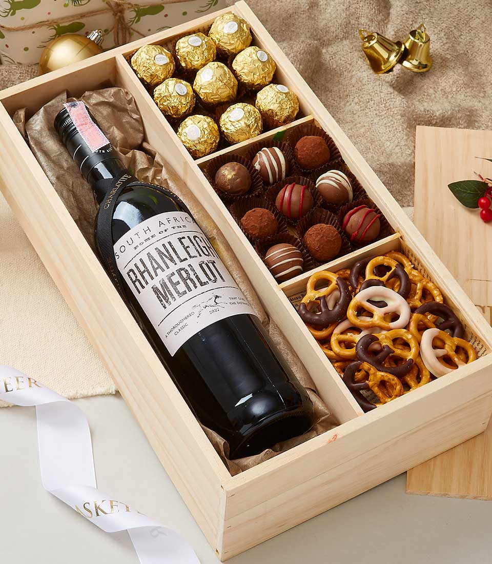 Premium wooden gift box with South African Merlot, gold-foiled chocolates, and assorted truffles