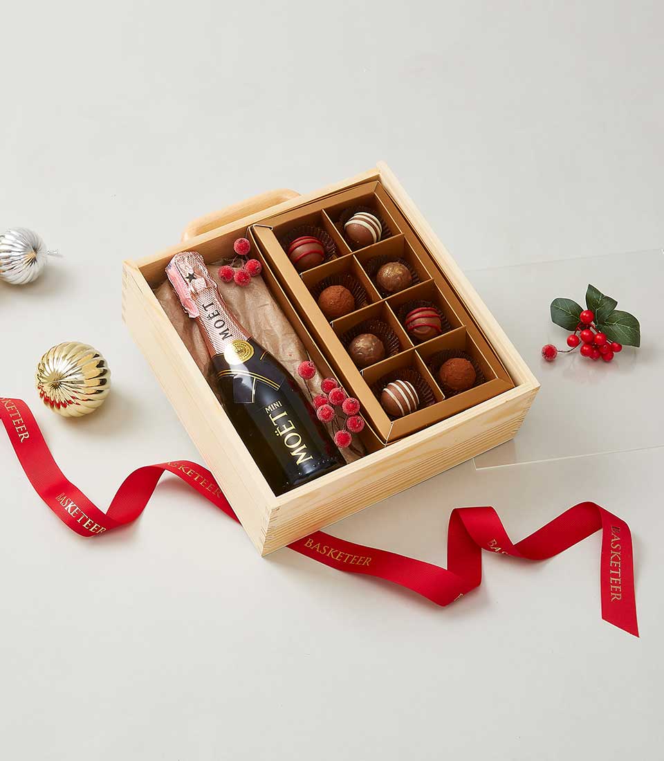 Champagne and chocolate gift box with mini bottle, assorted truffles, and wooden presentation case