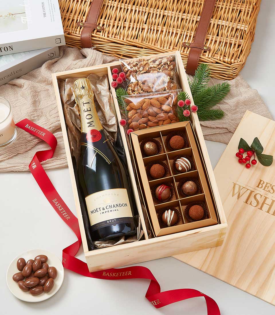 Luxe wooden champagne and chocolate gift crate with Moët & Chandon, artisan truffles, and roasted nuts