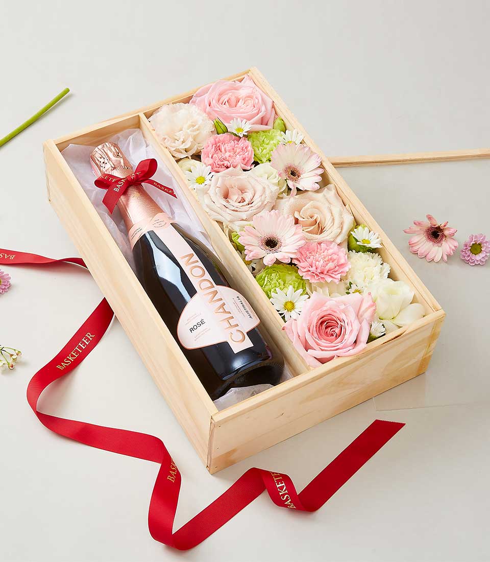 Chandon Rosé sparkling wine and fresh pink rose floral arrangement in wooden gift box