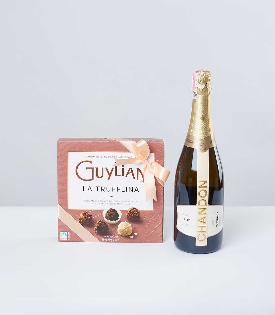 Luxury chocolate and Champagne gift set with Guylian truffles and Chandon Brut for Christmas celebrations