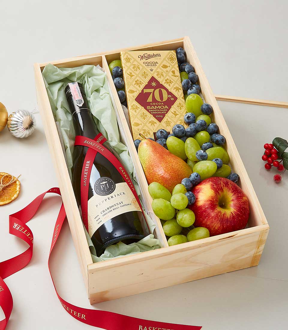 Premium wooden wine crate with Pepperjack Chardonnay, fresh fruit, and dark chocolate