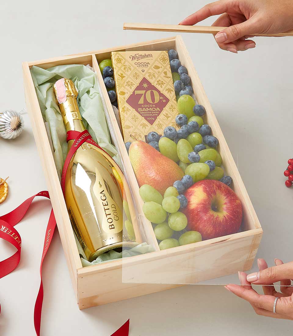 Bottega Prosecco Gold Brut with fresh grapes, berries, apple and pear in wooden gift box