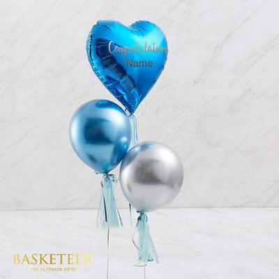 Blue congratulations balloon set with heart-shaped foil and metallic round balloons with tassels