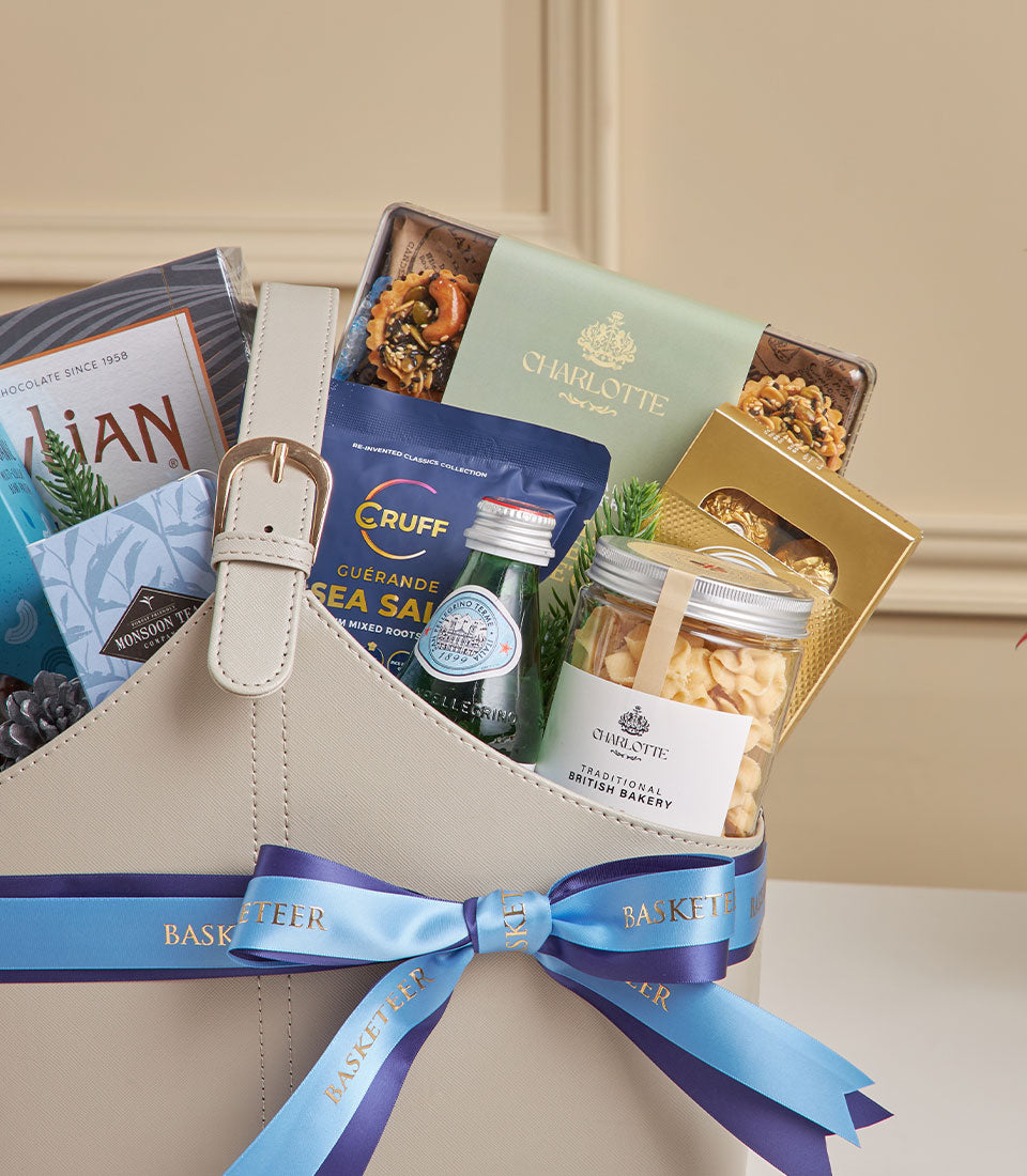 Elegant grey gourmet tea and coffee gift basket with leather strap and Charlotte Bakery treats, New Year hamper