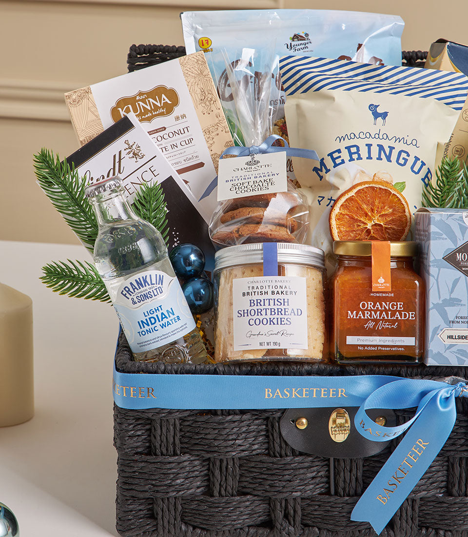 Blue morning granola and tea new year gift basket with gourmet tea, British shortbread, and artisan baked goods