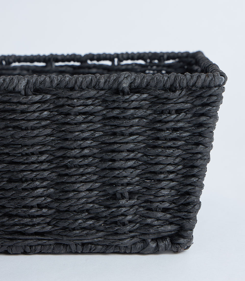 Dark woven rectangular basket with reinforced rim, perfect for luxury gift hampers and artisan displays