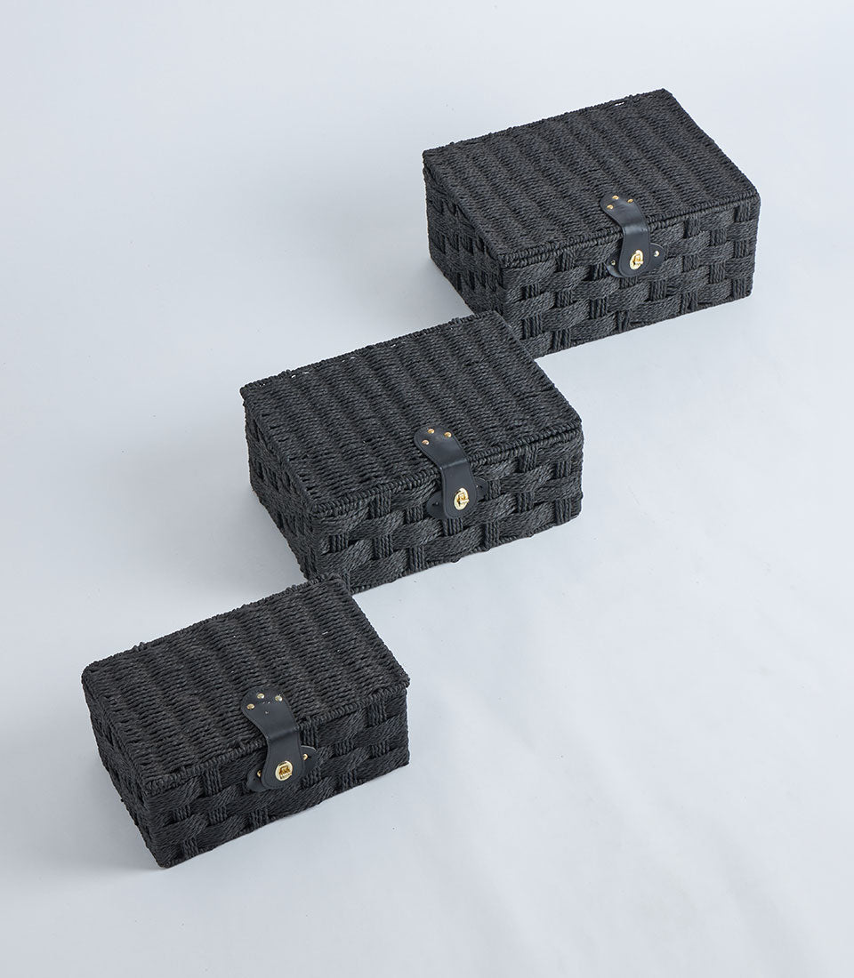 Black woven storage baskets with leather lock and gold clasp, set of three sizes