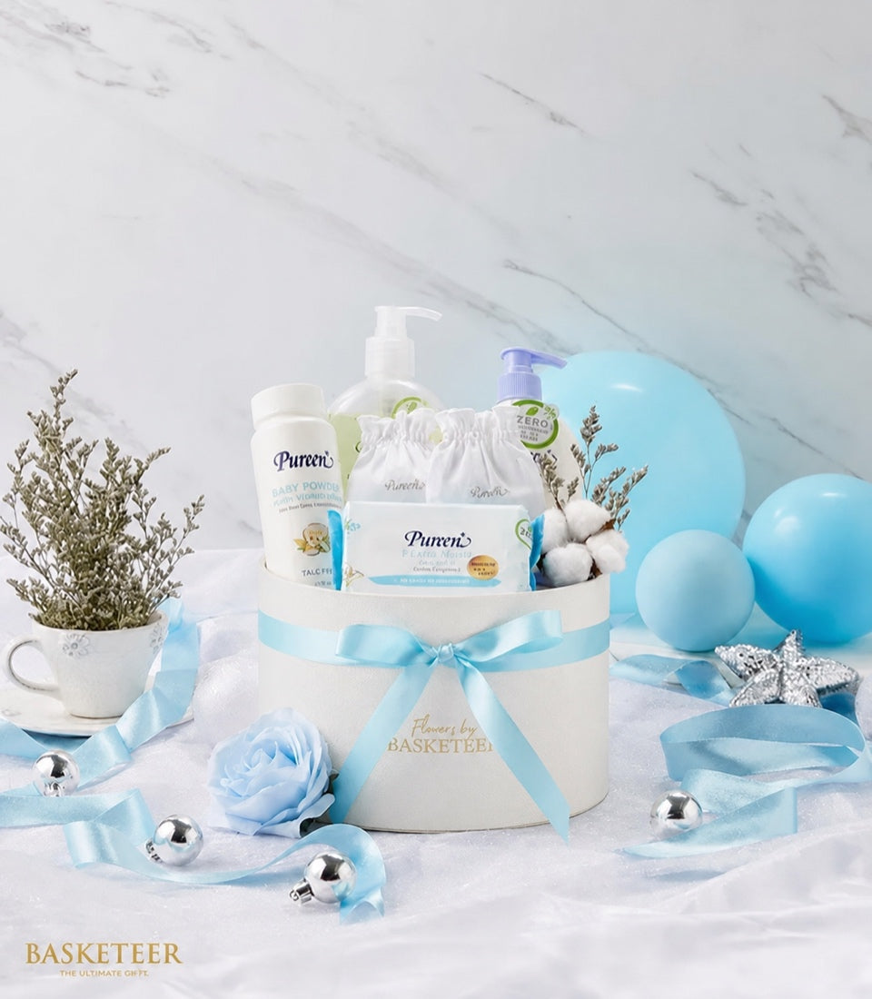 Basketeer premium baby gift set in a round white box with blue