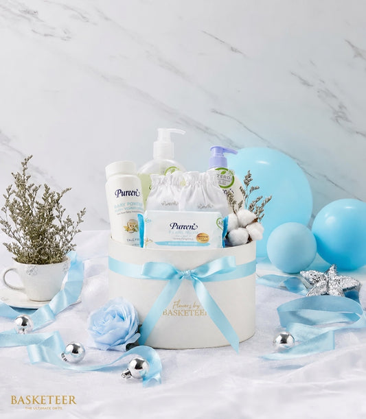 Basketeer premium baby gift set in a round white box with blue
