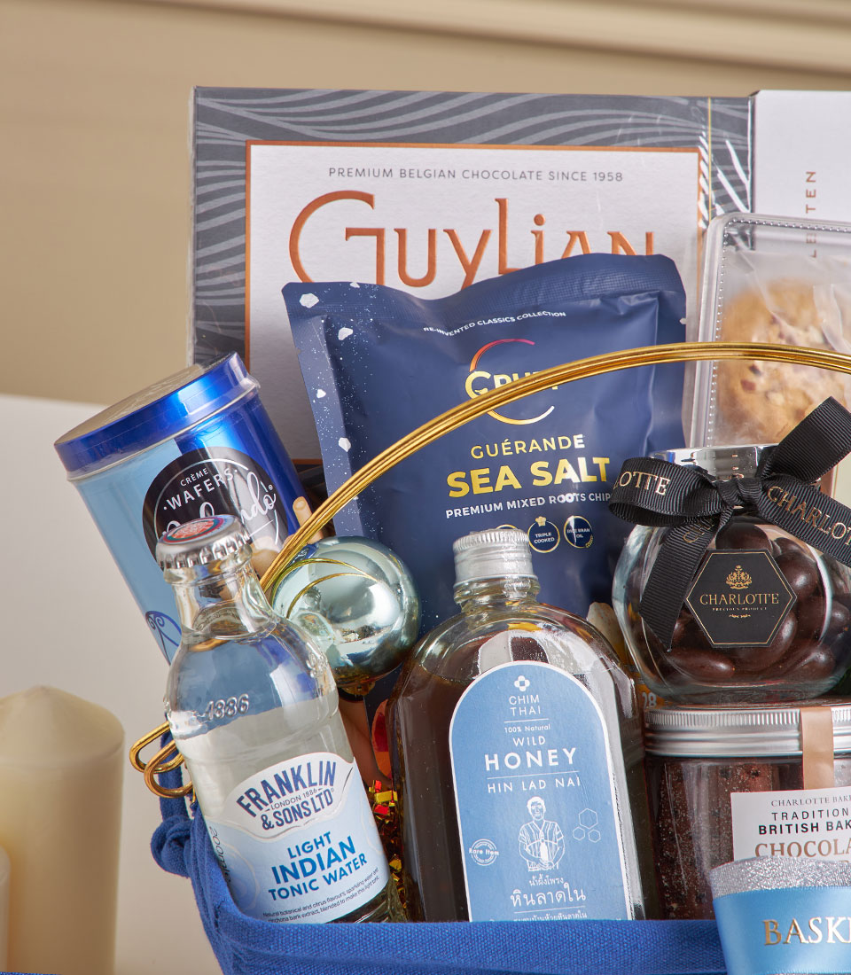 Midnight Blue luxury gift hamper with Belgian chocolates, gourmet snacks, and premium honey for New Year celebrations