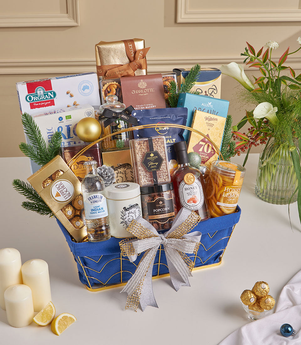 Grand blue gourmet gift basket with chocolate, honey, popcorn and festive New Year treats