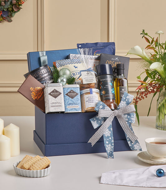 Luxury black truffle, bird's nest & chocolate gift hamper with festive blue snowflake ribbon, gourmet treats & white calla
