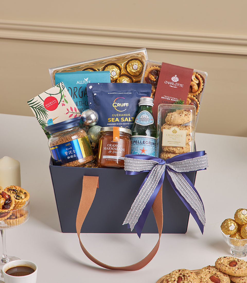 Golden Delight chocolate and coffee New Year gift hamper with Ferrero Rocher, premium chips, marmalade, sparkling water, and