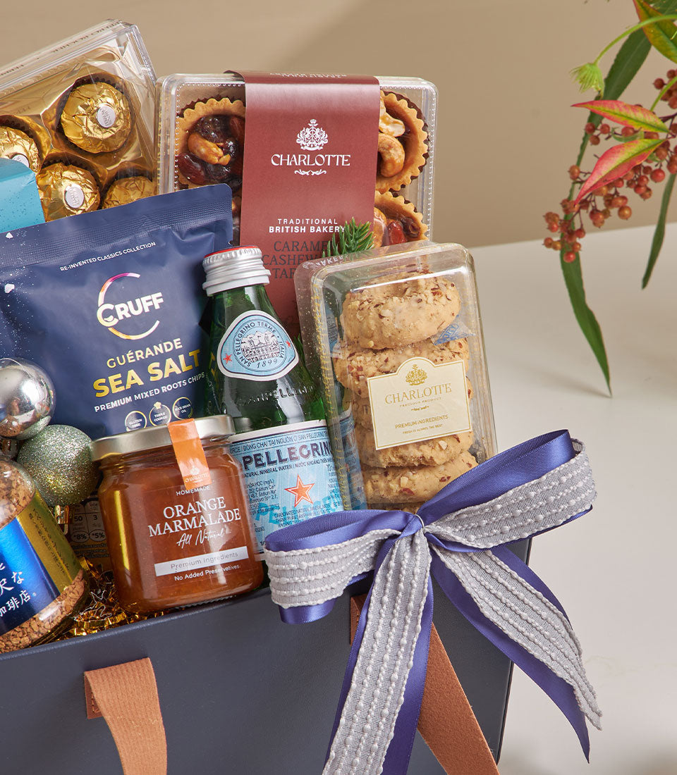 Golden Delight chocolate and coffee gourmet gift basket with Ferrero Rocher, Charlotte bakery treats, and premium snacks in