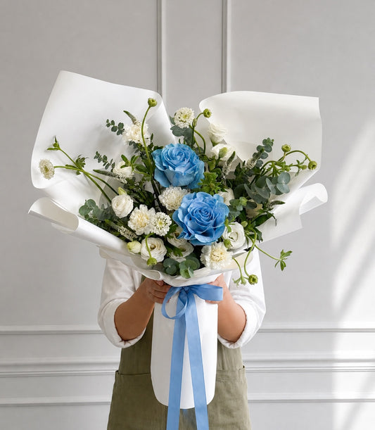 Basketeer luxury blue rose and white lisianthus bouquet, elegantly wrapped