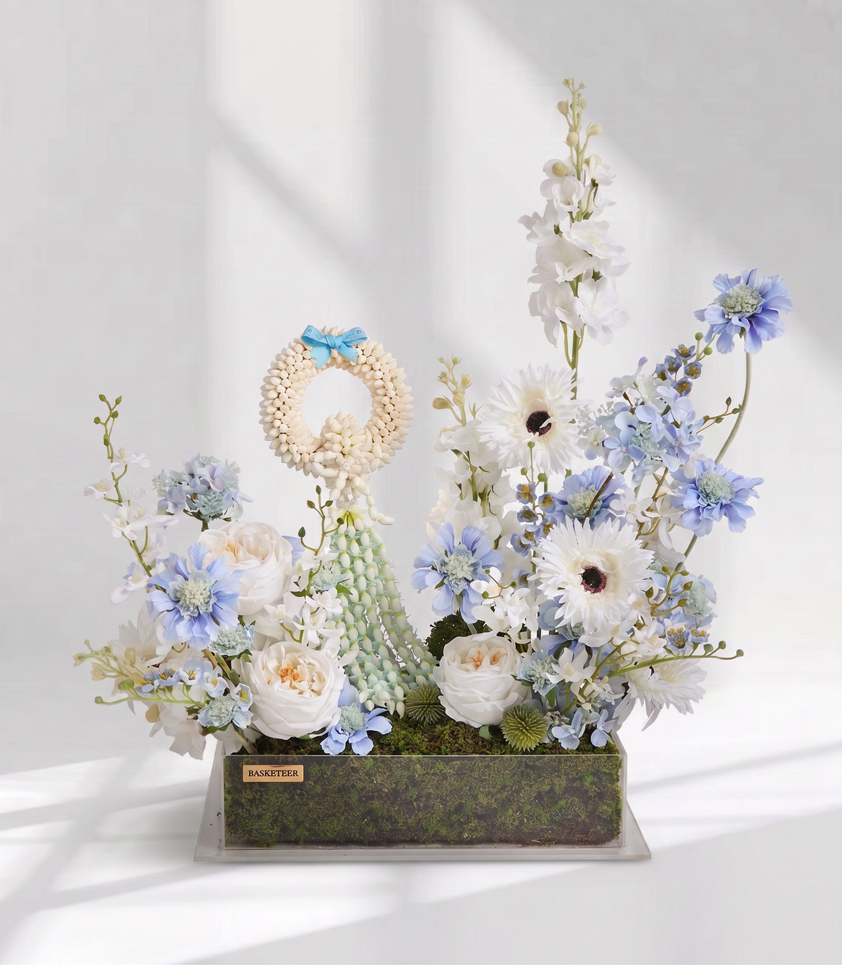 Basketeer premium floral gift box with a traditional Thai jasmine garland,