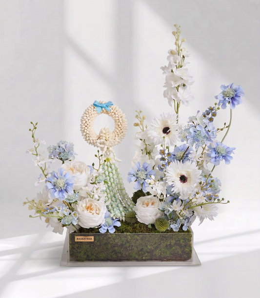 Basketeer premium floral gift box with a traditional Thai jasmine garland,