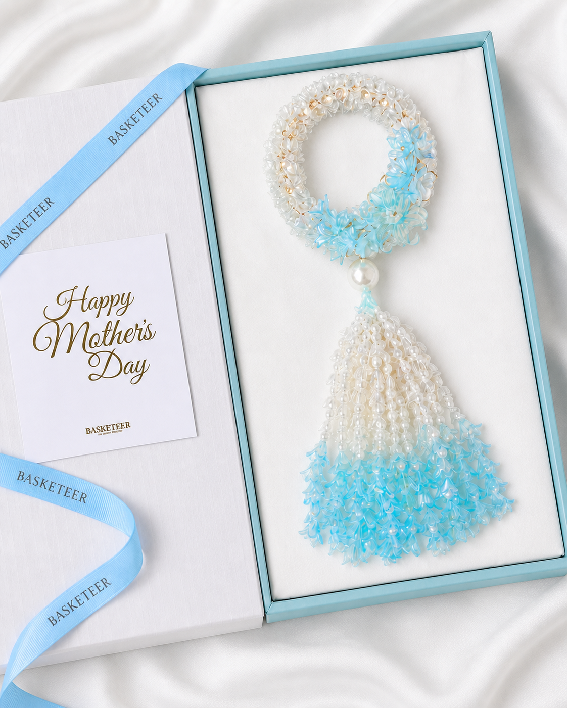 Basketeer's premium Mother's Day gift box features a shimmering