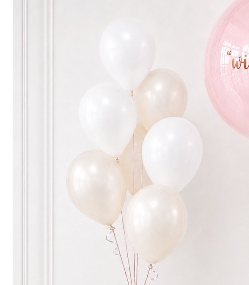 # Alt Text

Elegant balloon bunch in white and pearl cream with pink paper lantern, minimalist celebration decor against light backdrop.