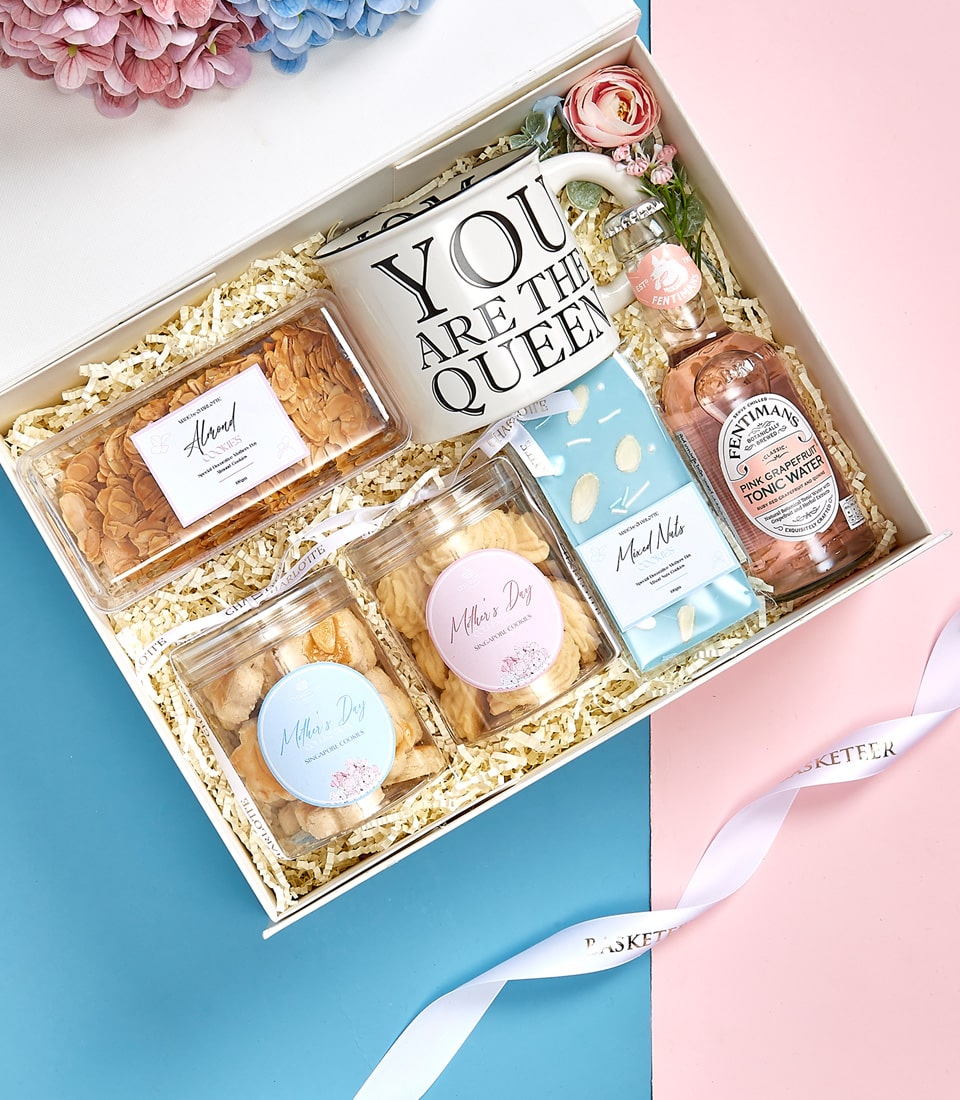 Mother's Day luxury gift box with almond cookies, Singapore cookies, mixed nuts, pink grapefruit tonic, and queen mug