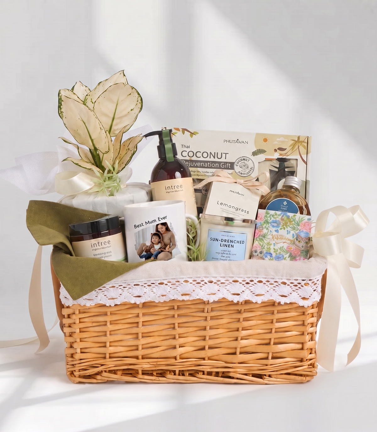Basketeer's luxurious wellness hamper featuring a wicker basket with lace trim,