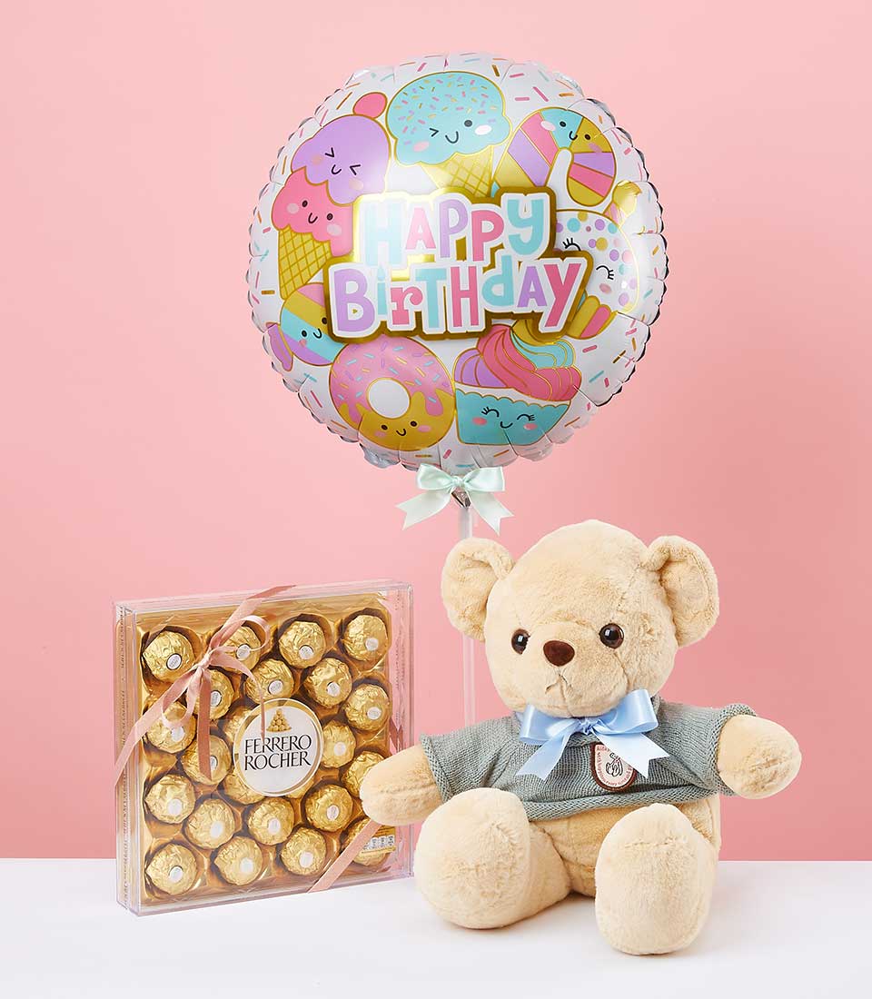 Happy Birthday foil balloon with pastel ice cream design, Ferrero Rocher chocolates, and soft teddy bear gift set