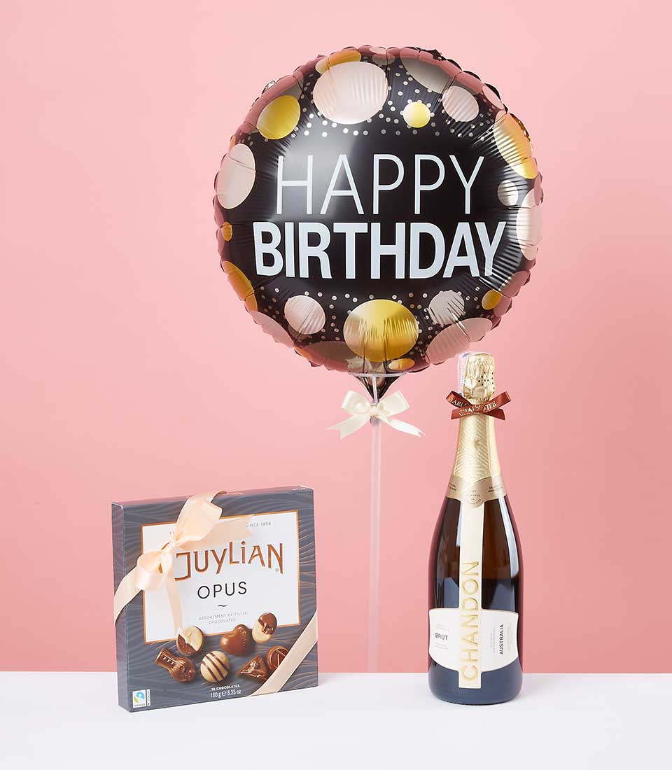 Luxury champagne gift set with Belgian chocolates, birthday balloon, and sparkling wine
